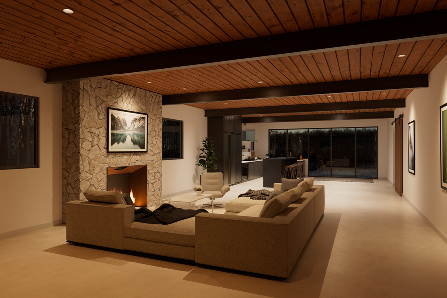 A view of a luxurious home interior showcasing integrated architectural lighting with soft, warm tones at night.